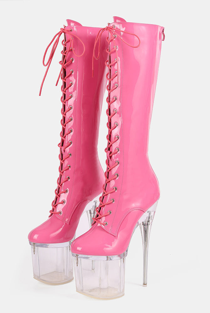 Pink knee-high patent lace-up stiletto boots with clear platform heel