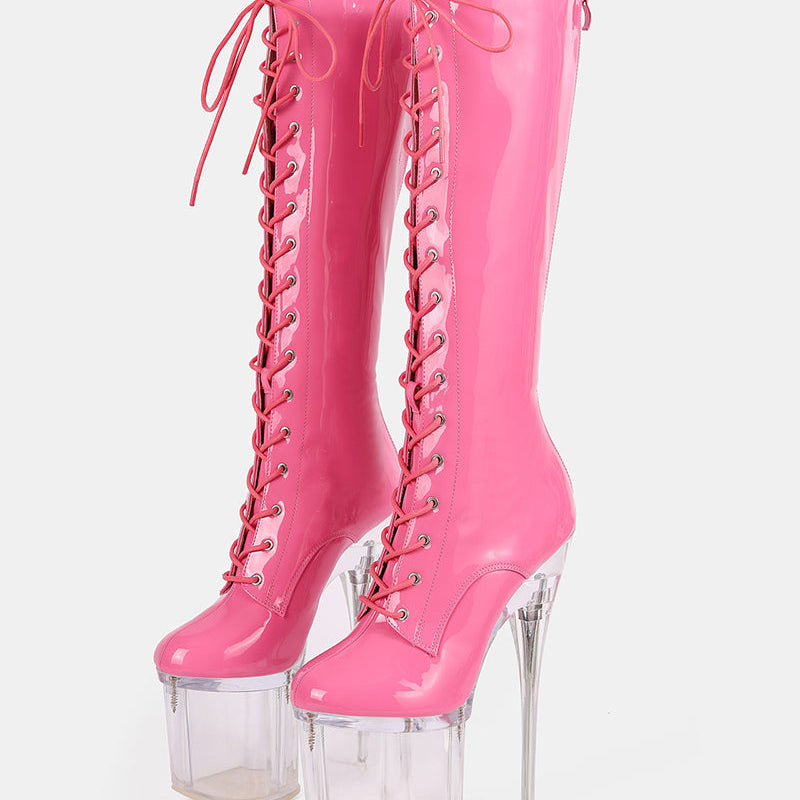 Pink knee-high patent lace-up stiletto boots with clear platform heel