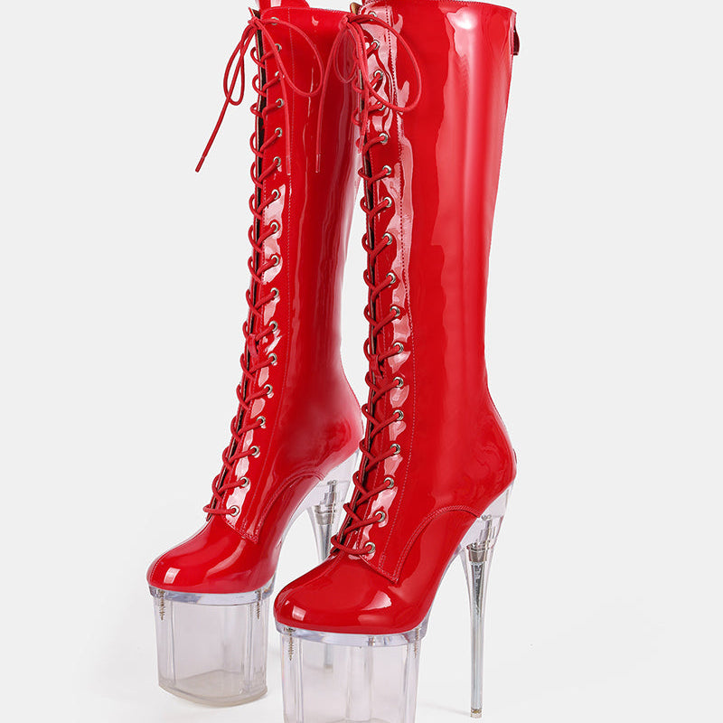 Red knee-high patent lace-up stiletto boots with clear platform heel
