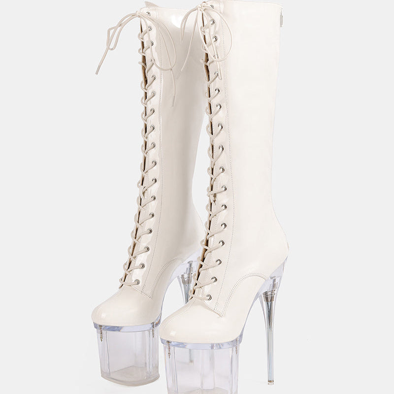White knee-high patent lace-up stiletto boots with clear platform heel