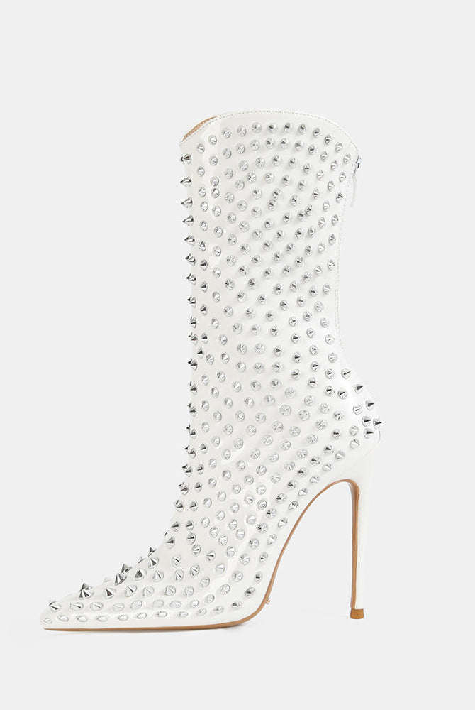 White mid-calf stiletto boot with pointed toe and silver spike studs