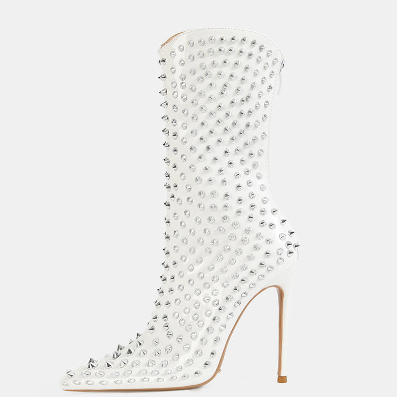 White mid-calf stiletto boot with pointed toe and silver spike studs
