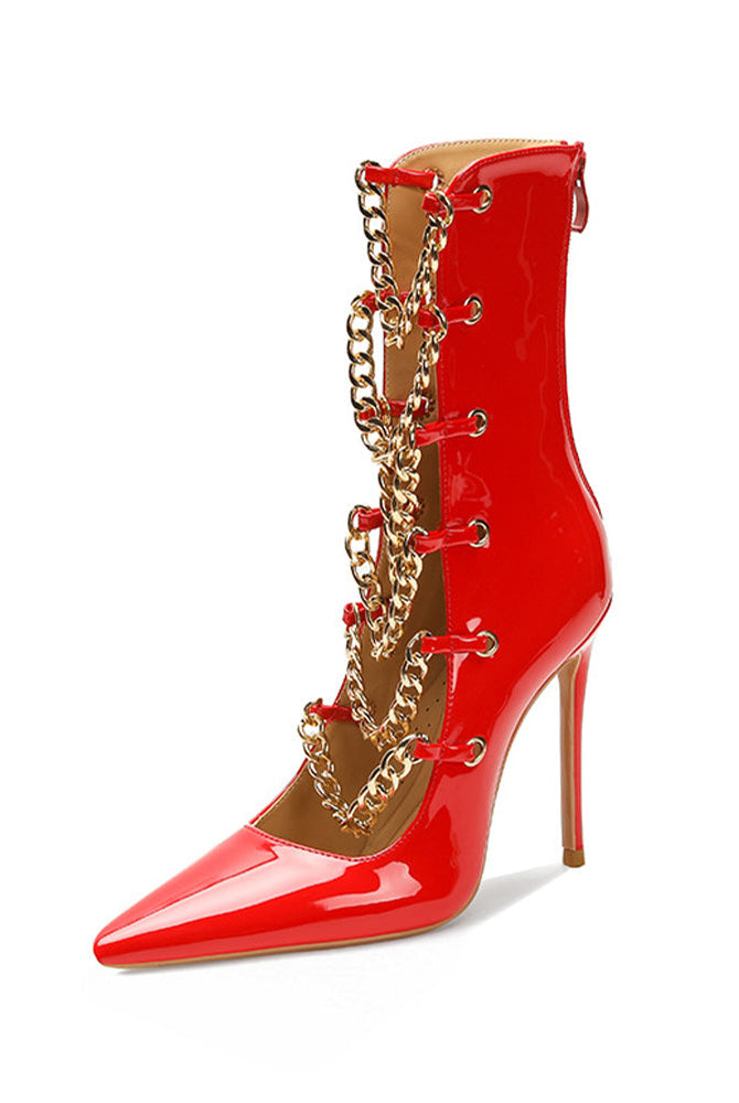 Red patent stiletto ankle boot with gold chain trim and pointed toe.