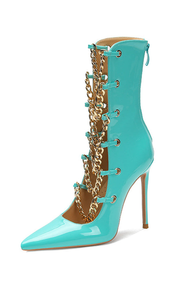 Sky blue patent stiletto ankle boot with gold chain trim and pointed toe.