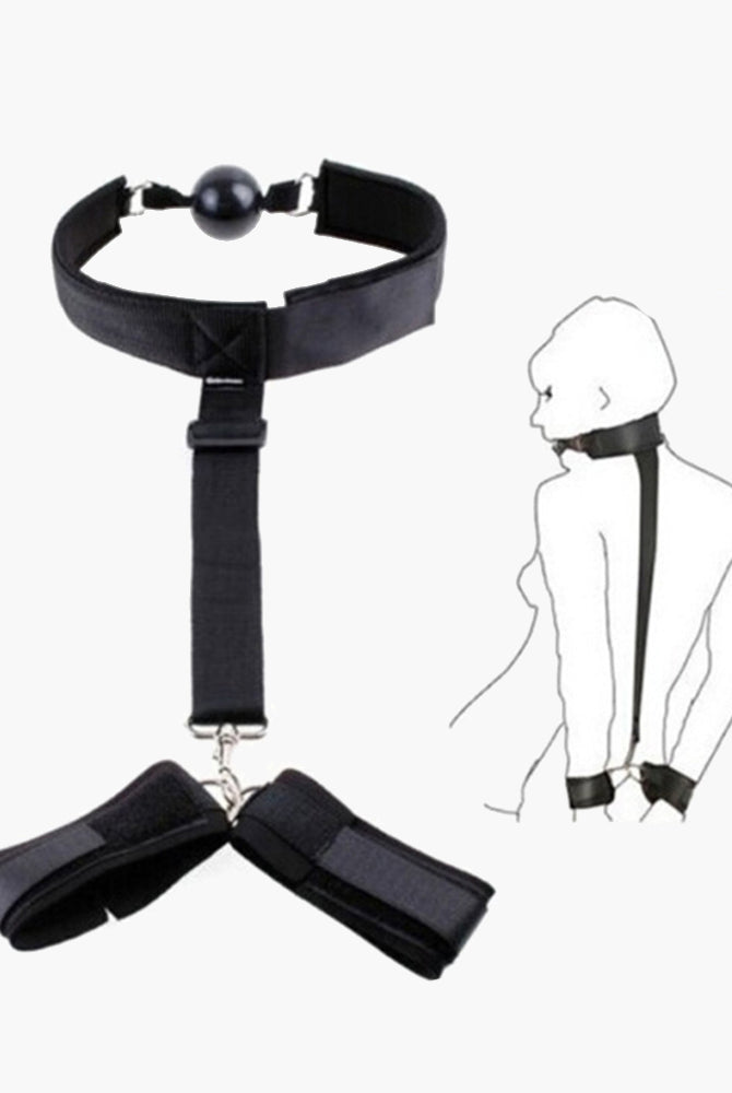 Black adjustable strap set with mouth gag and wrist restraints for intimate sessions