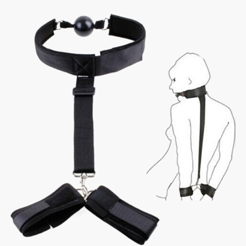 Black adjustable strap set with mouth gag and wrist restraints for intimate sessions