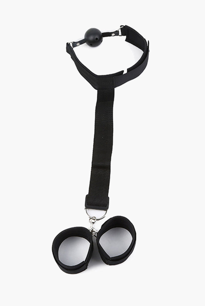 Adjustable black restraint set with ball gag and wrist restraints for intimate exploration.