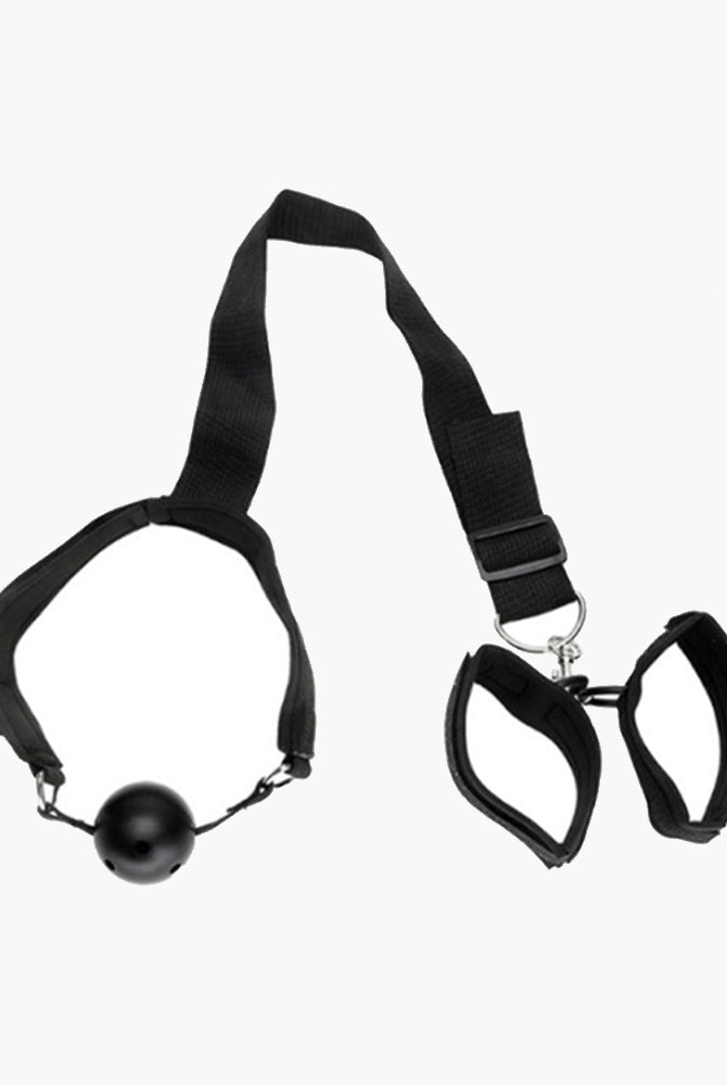 Black adjustable restraint set with mouth gag and wrist restraints for intimate exploration