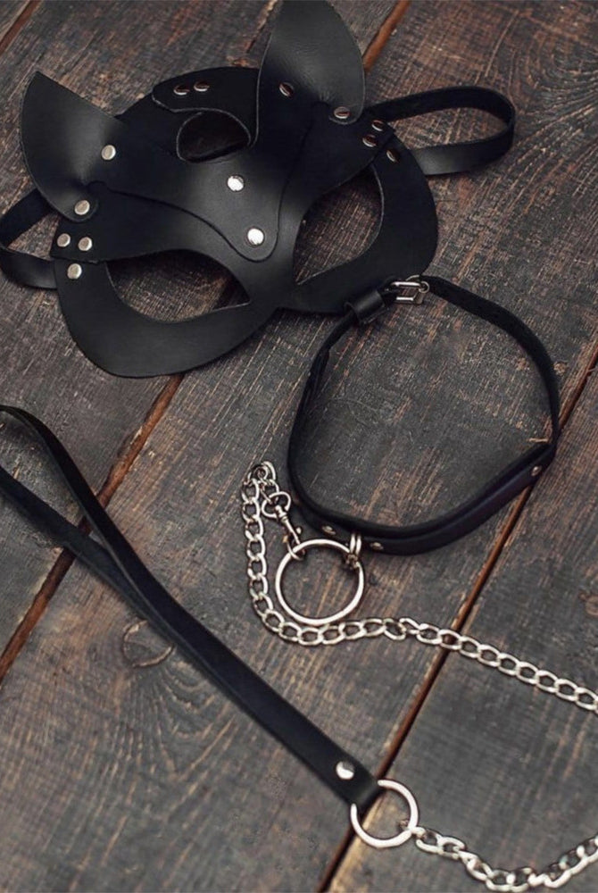 Black leather cat mask with pointed ears and black leash with snap and chain