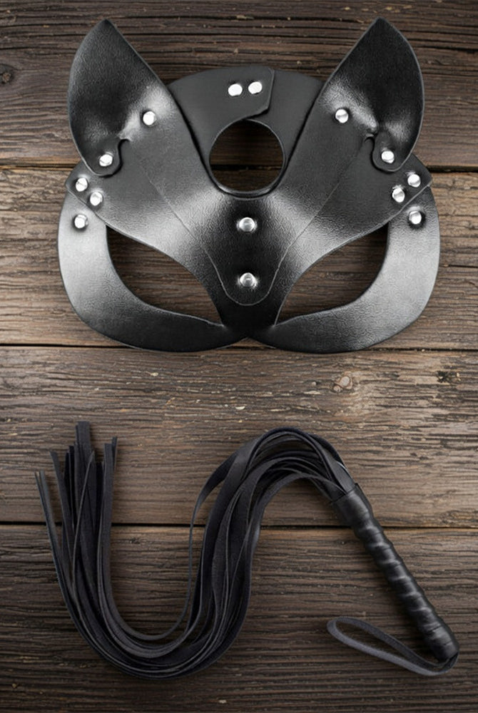 Black leather cat ear mask with eye cutouts and black braided leash