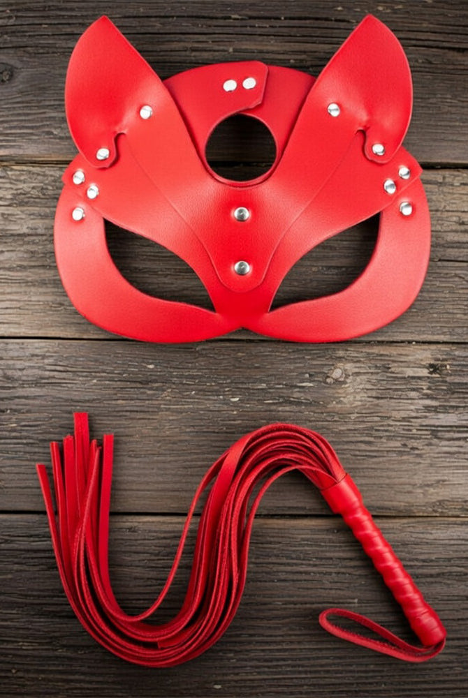 Red leather cat ear face mask with oval eye cutouts and red braided leash