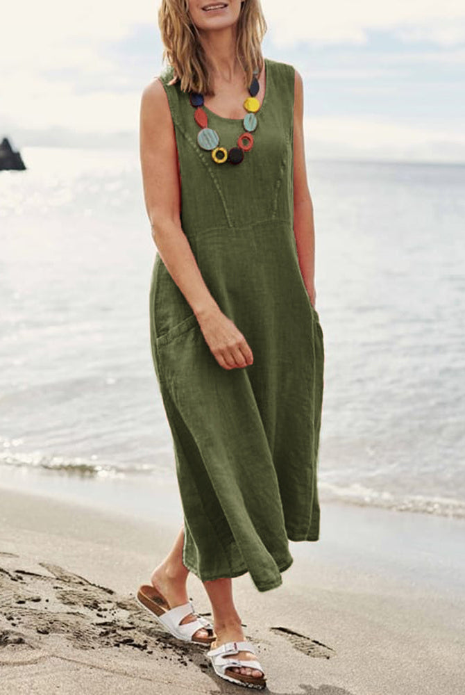 Olive green sleeveless linen dress with pockets, perfect for vacation