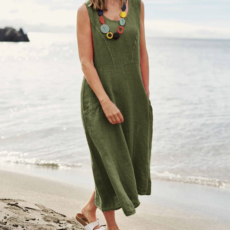 Olive green sleeveless linen dress with pockets, perfect for vacation