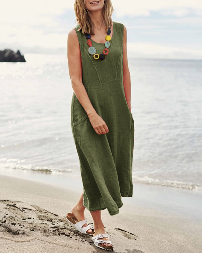Olive green sleeveless linen dress with pockets, perfect for vacation