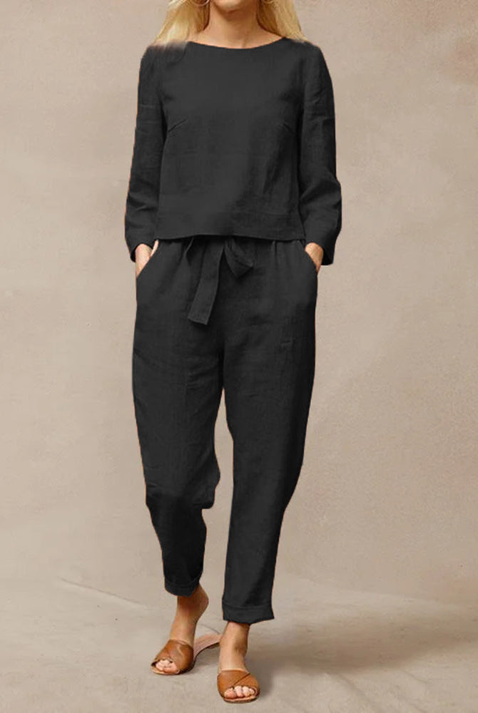 Black cotton two-piece pants set with tie belt, perfect for vacation and leisure wear