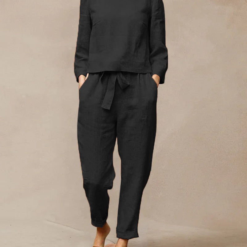 Black cotton two-piece pants set with tie belt, perfect for vacation and leisure wear