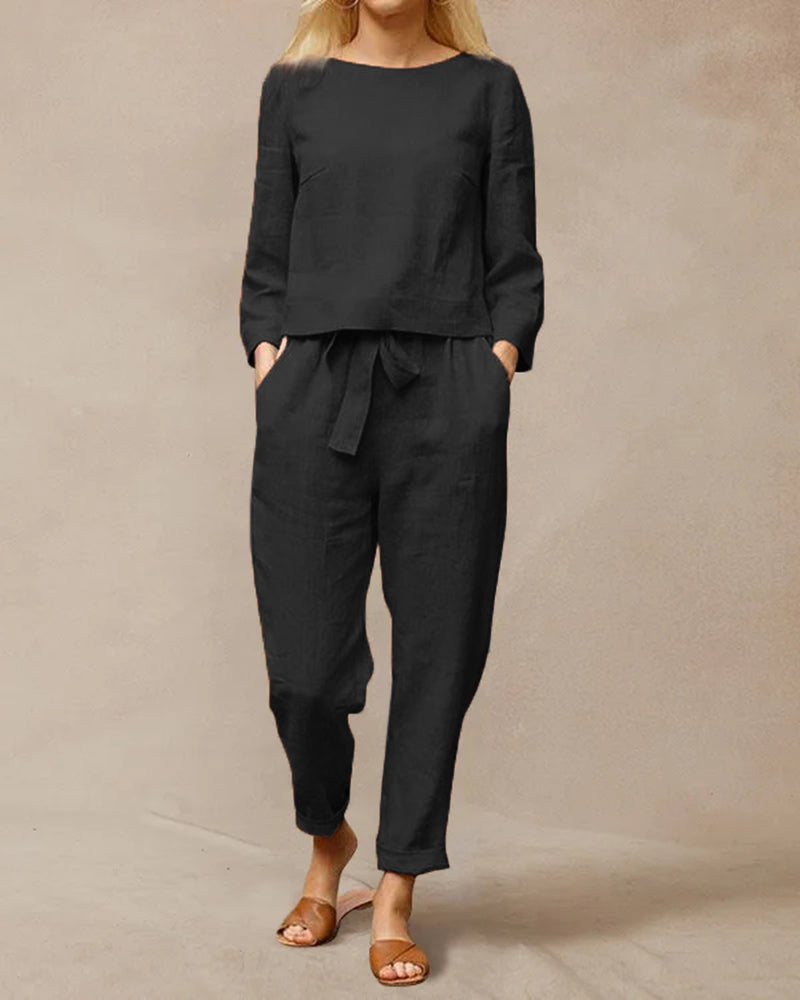 Black cotton two-piece pants set with tie belt, perfect for vacation and leisure wear