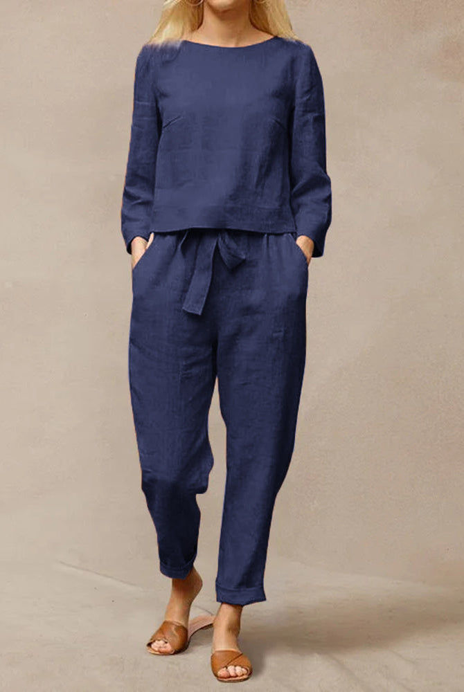 Navy blue cotton two-piece pants set, vacation and leisure wear. Tie belt and long sleeves.
