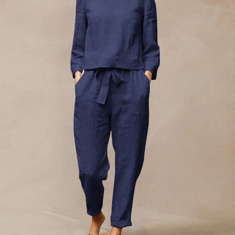 Navy blue cotton two-piece pants set, vacation and leisure wear. Tie belt and long sleeves.