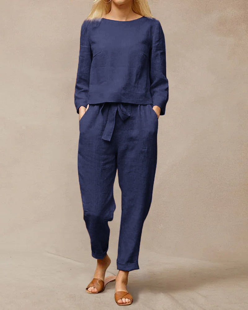 Navy blue cotton two-piece pants set, vacation and leisure wear. Tie belt and long sleeves.