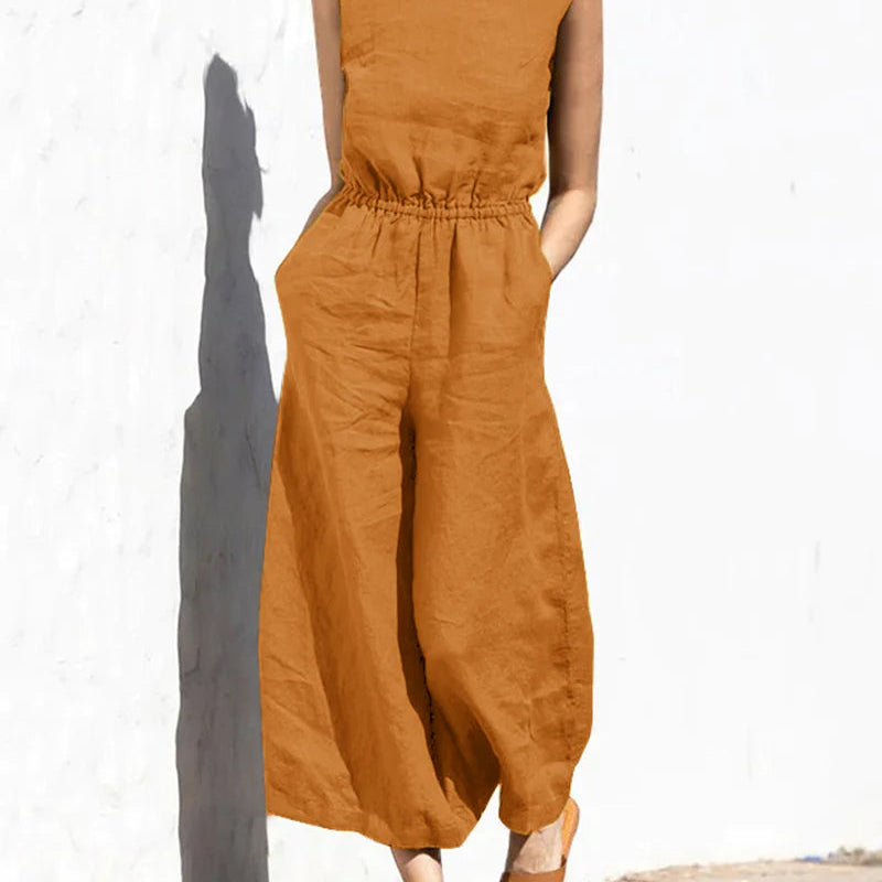 Rust-orange wide leg cotton jumpsuit with elastic waist, perfect for casual and daily wear.