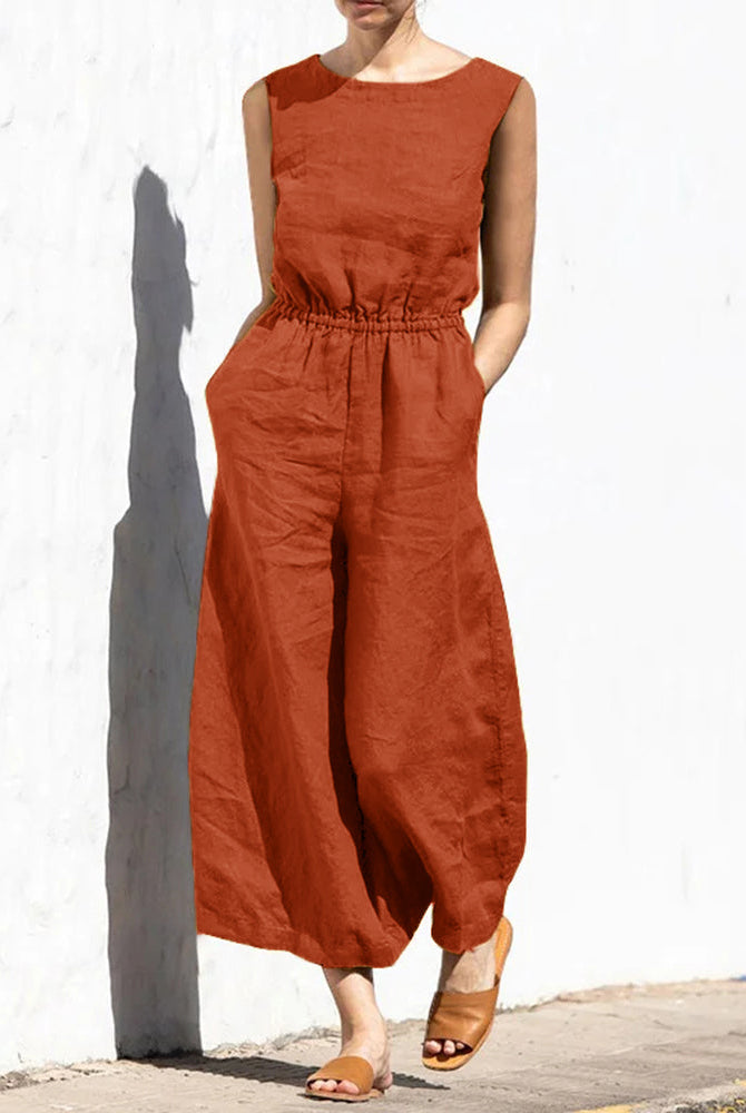 Rust-colored wide leg cotton jumpsuit with elastic waist, perfect for casual and daily wear.