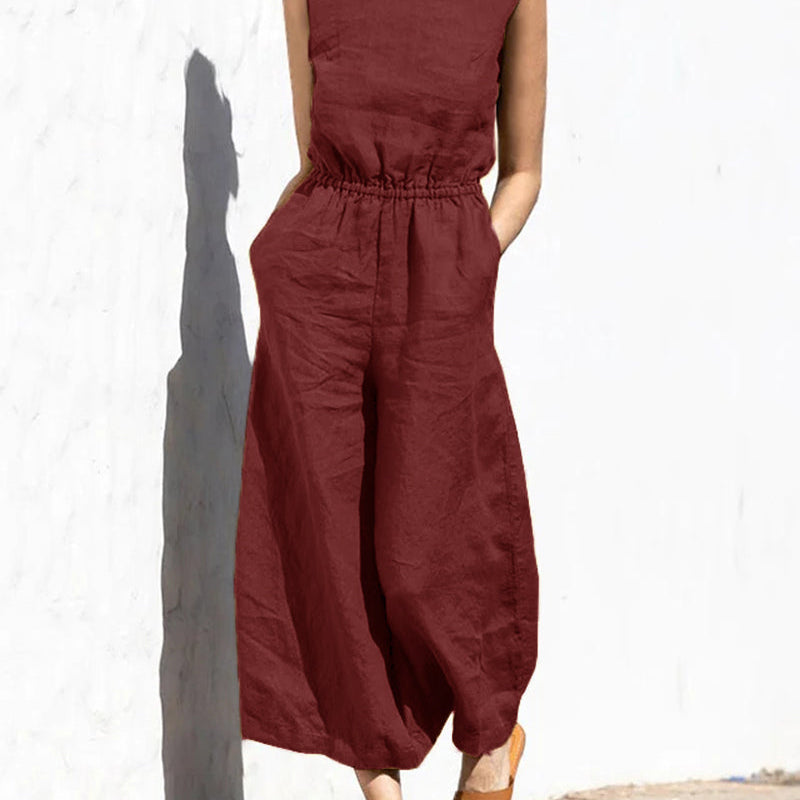 Rust-red wide leg cotton jumpsuit with elastic waist, perfect for casual and daily wear.