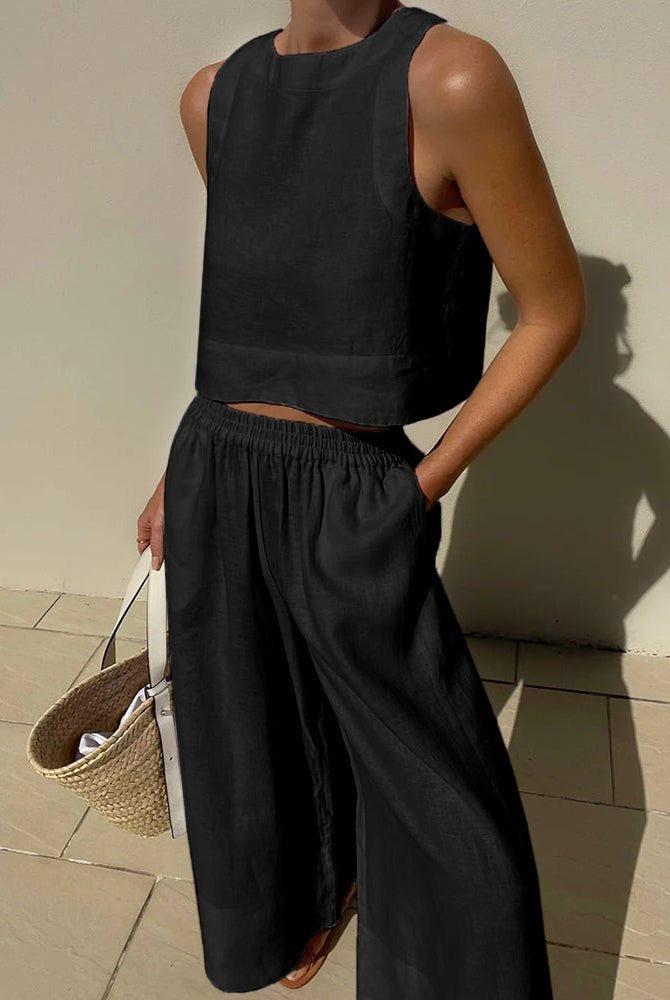 Black linen crop top and wide leg pants set. Comfortable and stylish summer outfit for women.