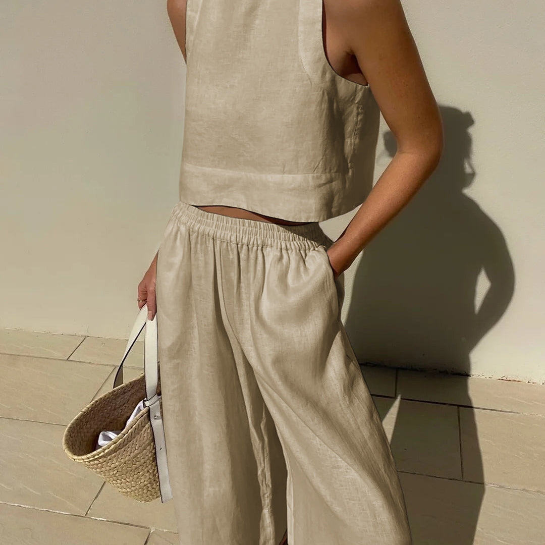 Beige linen crop top and wide leg pants set. Vacation style, breathable linen outfit for summer.