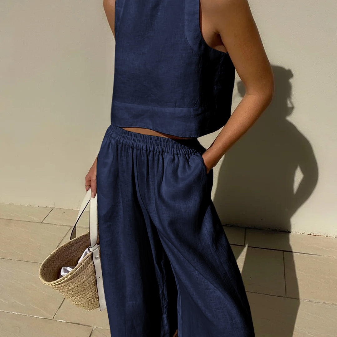 Navy blue linen crop top and wide leg pants set. Vacation style, breathable summer outfit.