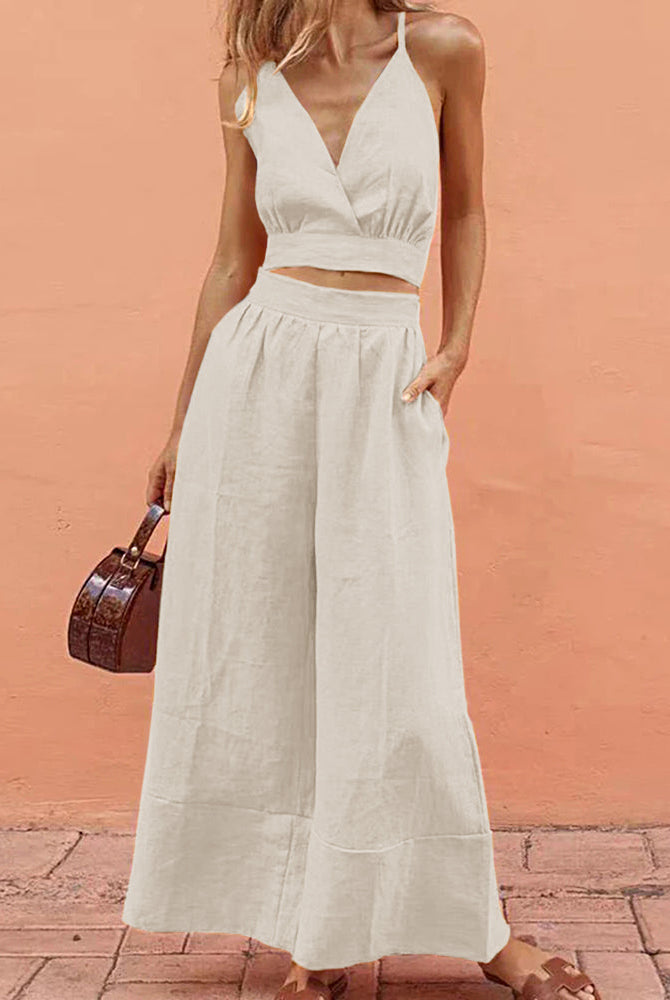White crop top and wide-leg pants set. Vacation style, perfect for leisure and daily wear.