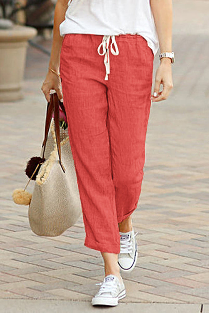 Coral drawstring elastic pants in linen and cotton blend, casual style for women.