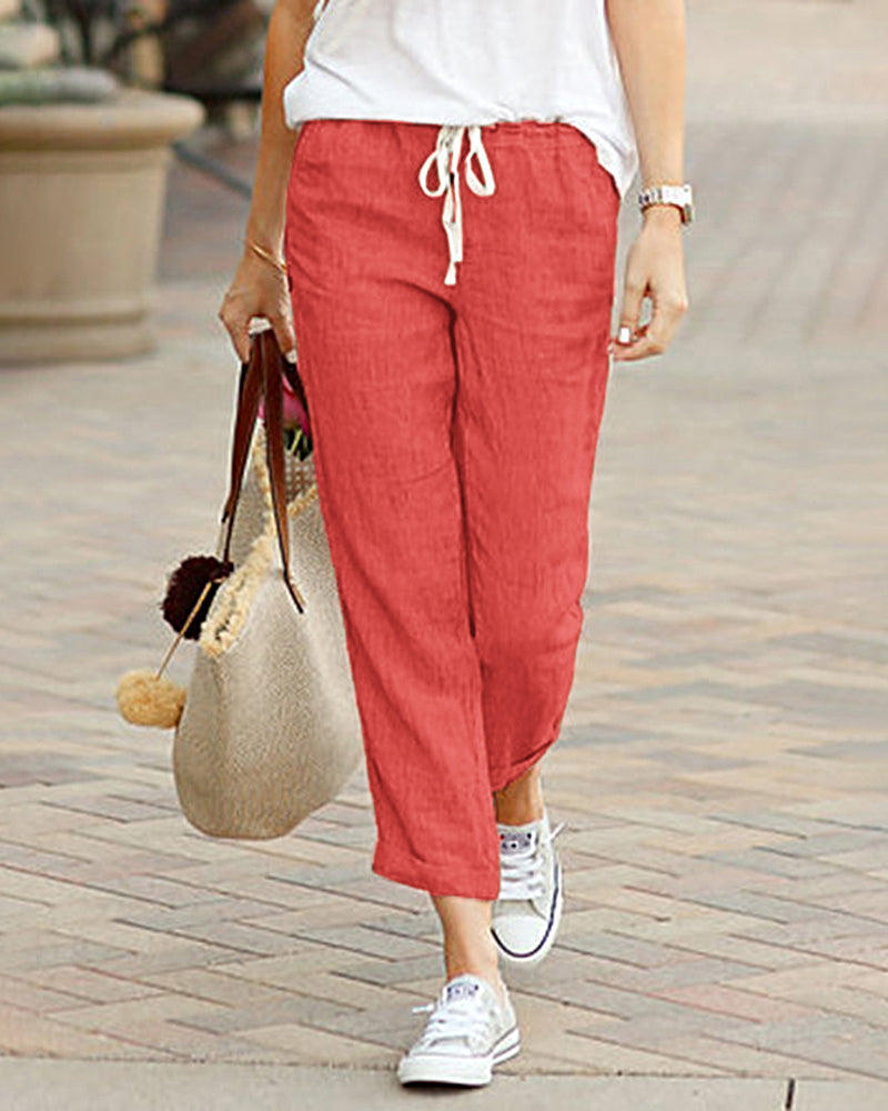 Coral drawstring elastic pants in linen and cotton blend, casual style for women.