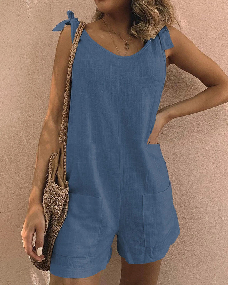 Blue linen pocket shorts jumpsuit with tie shoulder straps, casual summer outfit