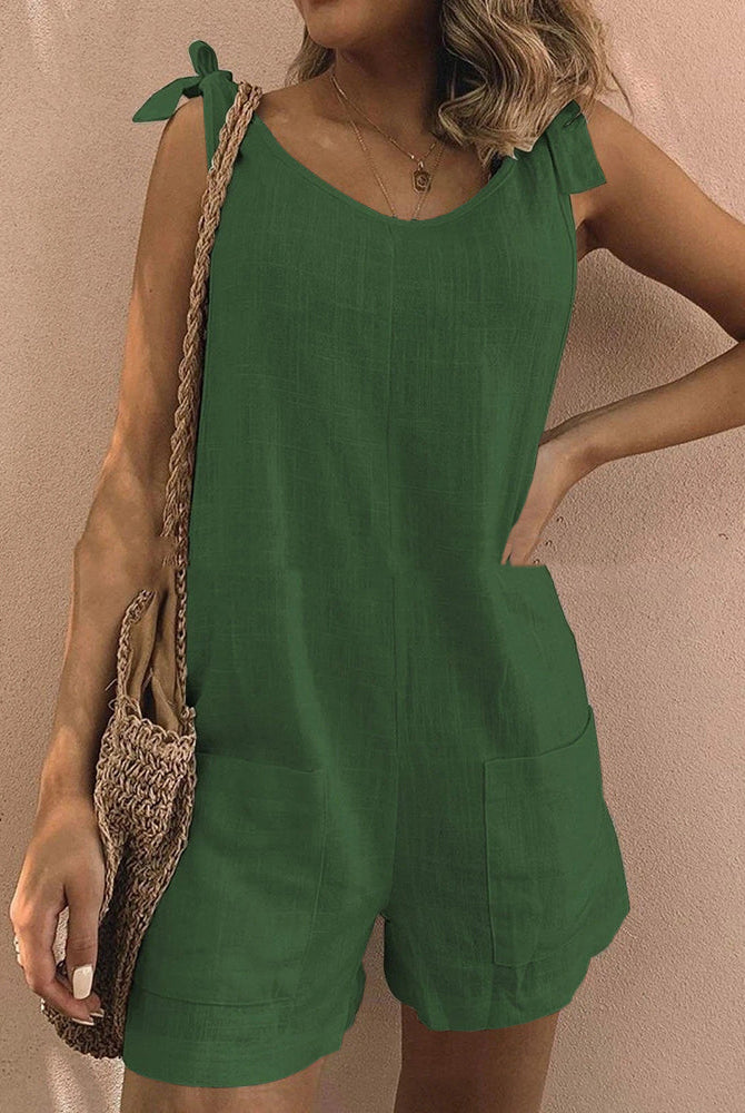 Green pocket shorts jumpsuit with tie shoulder straps, casual summer outfit