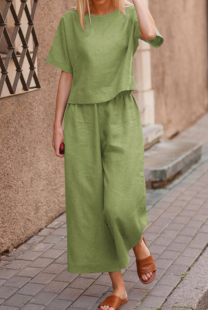 Green linen loose fit two piece set for women. Comfortable top and wide leg pants, casual outfit.