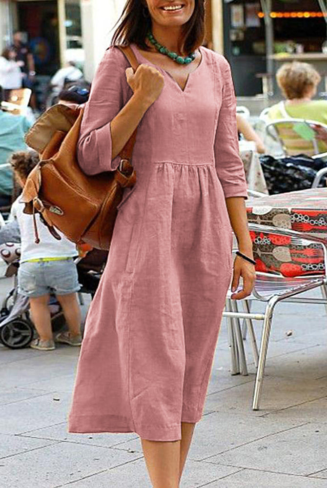 Pink cotton linen beach dress with V-neck and 3/4 sleeves, perfect for vacation