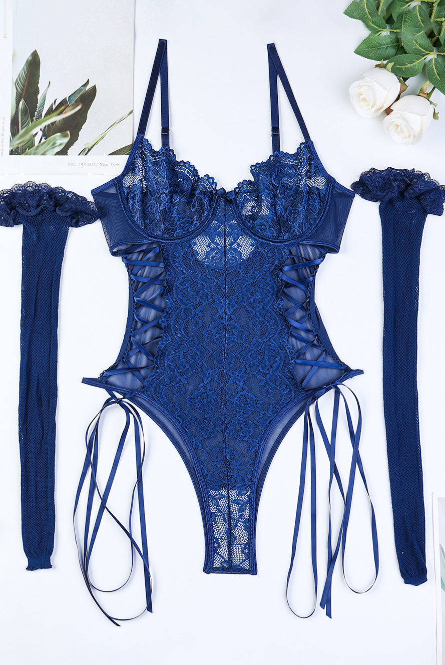 Navy blue lace bodysuit with side tie and floral pattern, and stockings. Sexy lingerie set.