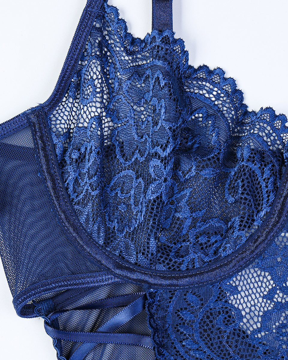 Navy blue floral lace bodysuit with side tie. Sexy lingerie for women. Sheer and elegant design.