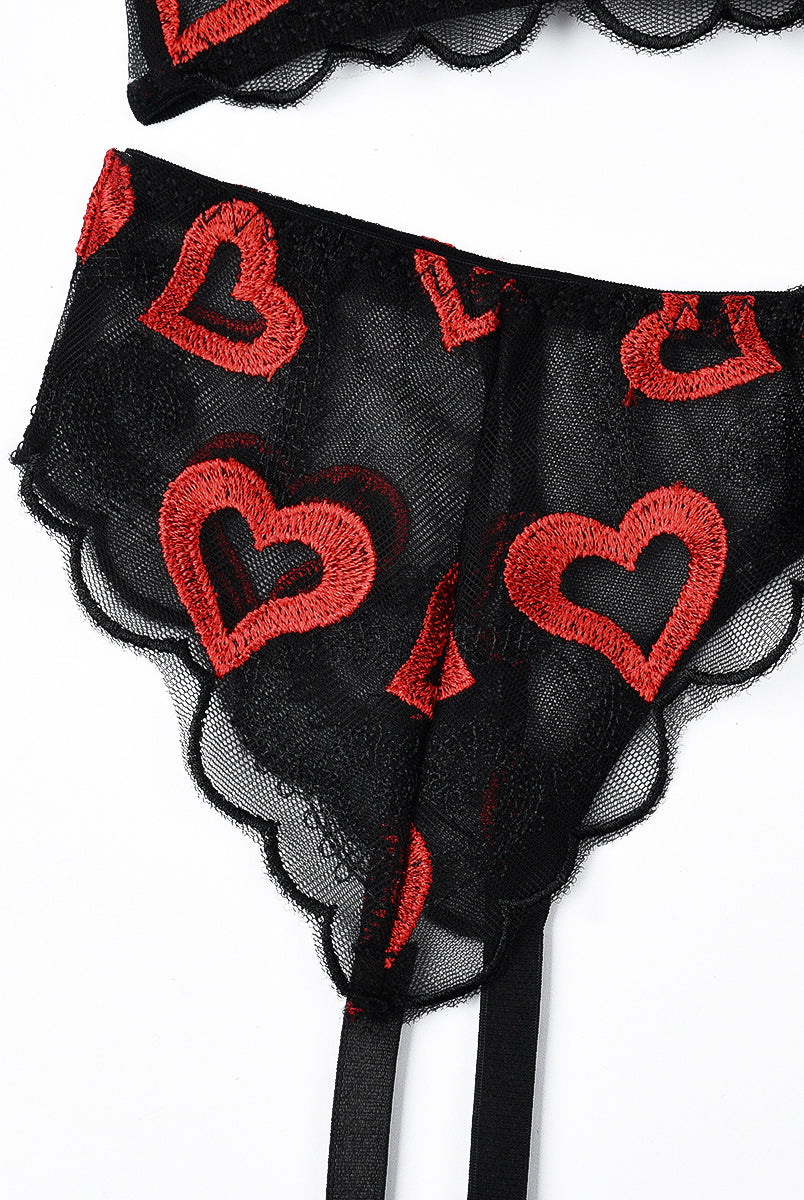 Black lace lingerie set with red heart embroidery; garter belt