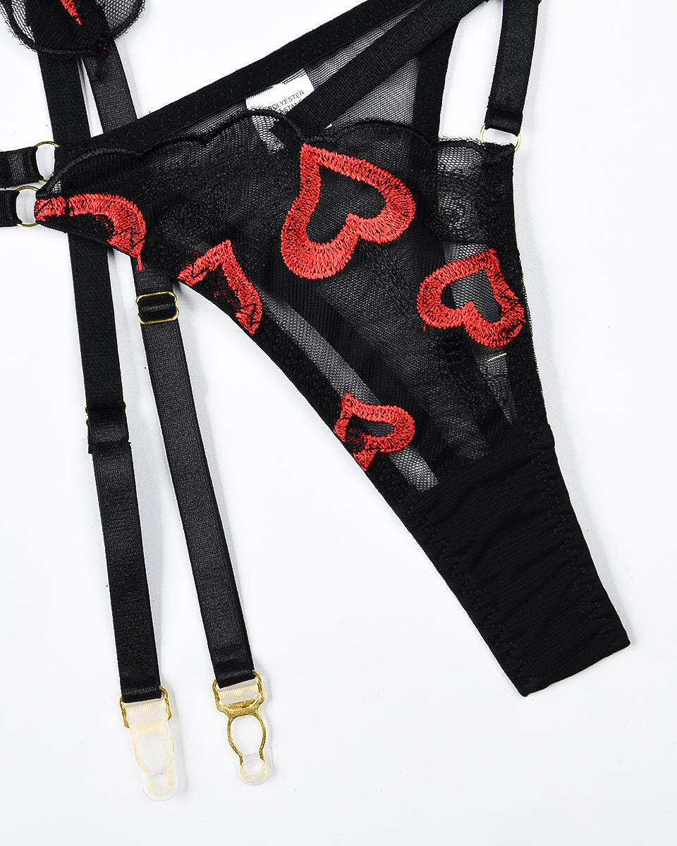 Black lace lingerie set with red heart embroidery; garter belt and thong with adjustable straps
