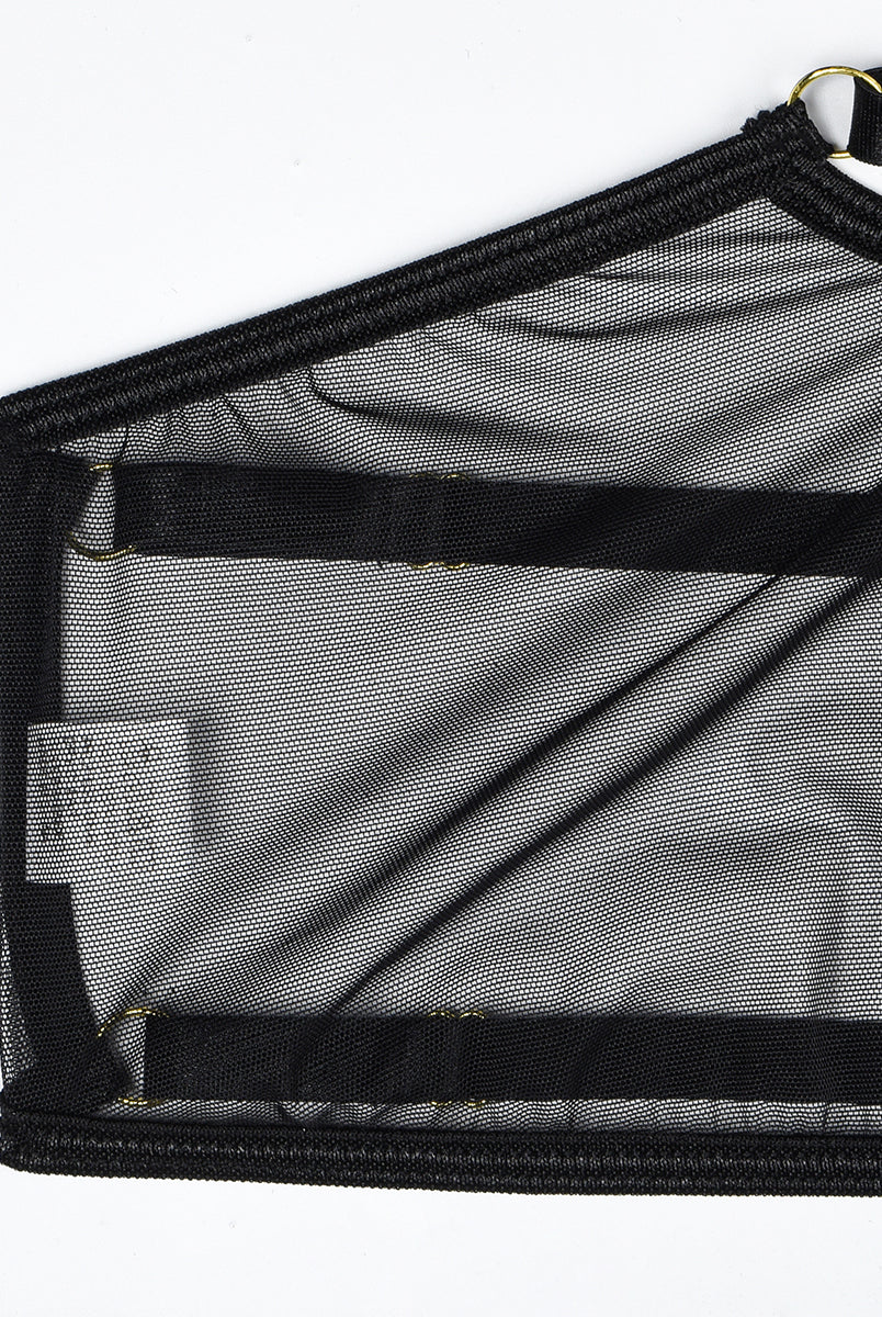 Black sheer mesh bra with adjustable straps and gold hardware. Sexy lingerie for women.