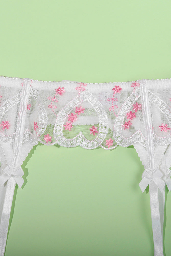 White embroidered heart garter belt with pink floral details, sweet and seductive lace