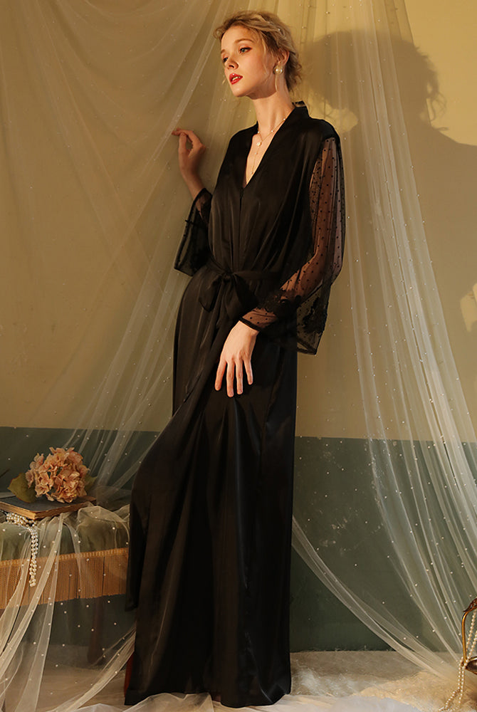 Black satin night robe with lace sleeves, perfect for relaxing evenings. Silky, elegant loungewear.