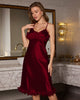 Burgundy satin nightdress with lace patchwork, adjustable straps. Perfect for party or daily wear.