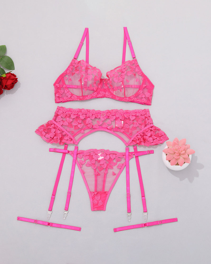 Pink heart lace lingerie set. Heart embroidery bra, garter belt, and thong. Sexy lingerie for women.