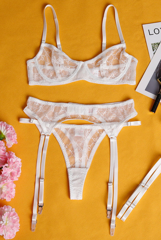 White chain sheer lace lingerie set with bra, garter belt, and thong. Sweet and seductive design.