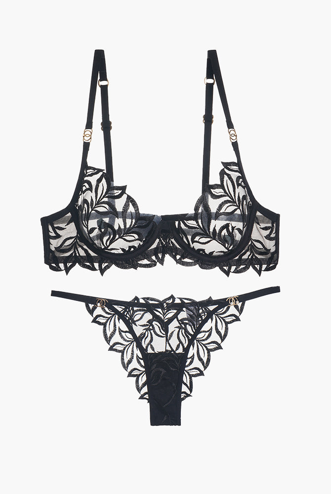 Black lace bra and panty set with floral embroidery, adjustable straps, and see-through design.