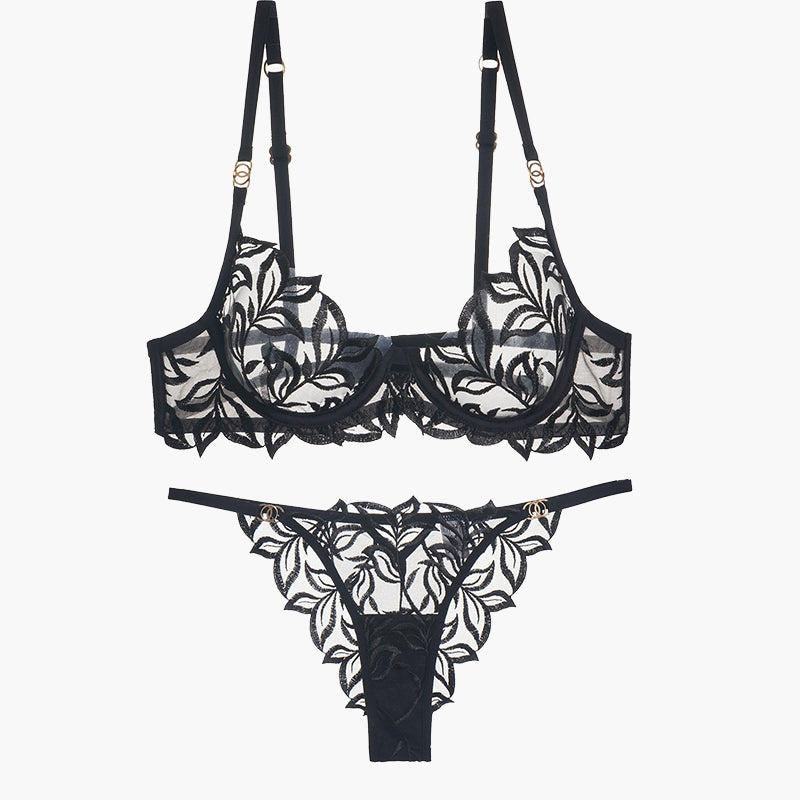 Black lace bra and panty set with floral embroidery, adjustable straps, and see-through design.