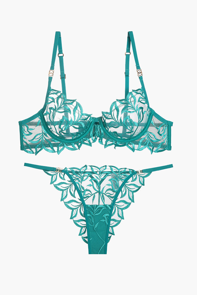 Teal embroidered lace bra and panty set. Delicate floral design, adjustable straps, and see-through.